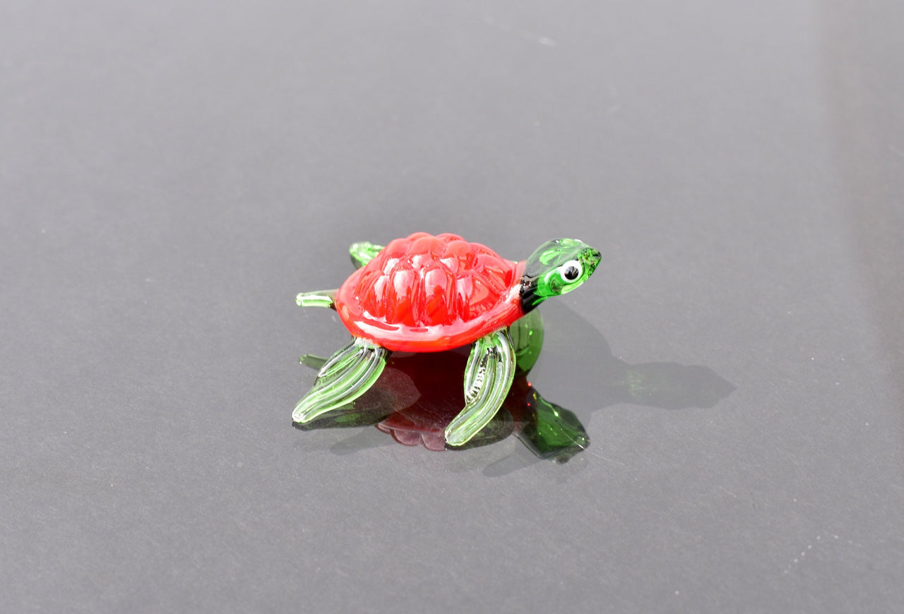 Red Glass Sea Turtle. Detailed figurine with a lot of character and personality.  Excellent addition to you glass menagerie collection