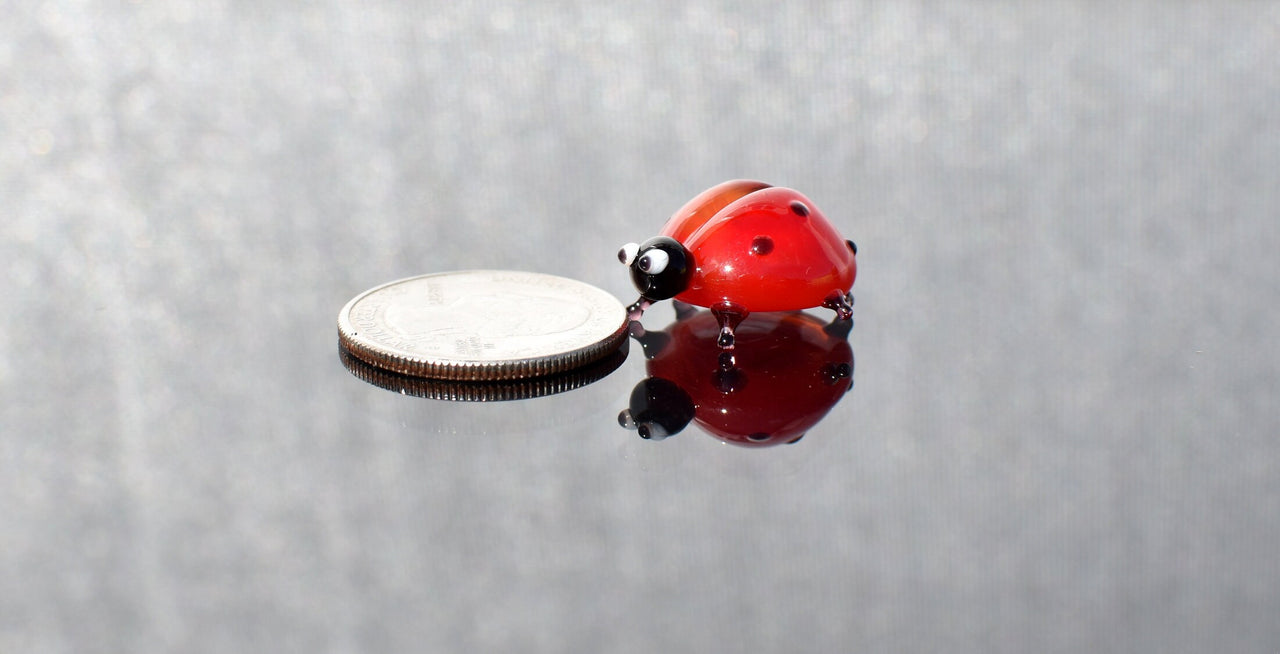 Hand-Blown Glass Ladybug Figurine: Red Insect Sculpture, Nature Lover Gift.