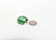 Green clear  color glass cute  hedgehog. Whimsical figurine with a lot of  personality. Excellent addition to your glass collection.