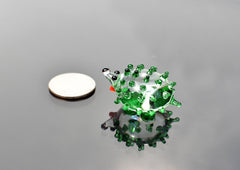 Green clear  color glass cute  hedgehog. Whimsical figurine with a lot of  personality. Excellent addition to your glass collection.