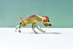 Hunting dog. Detailed realistic figurine with a lot of personality.  Excellent addition to  glass  collection.