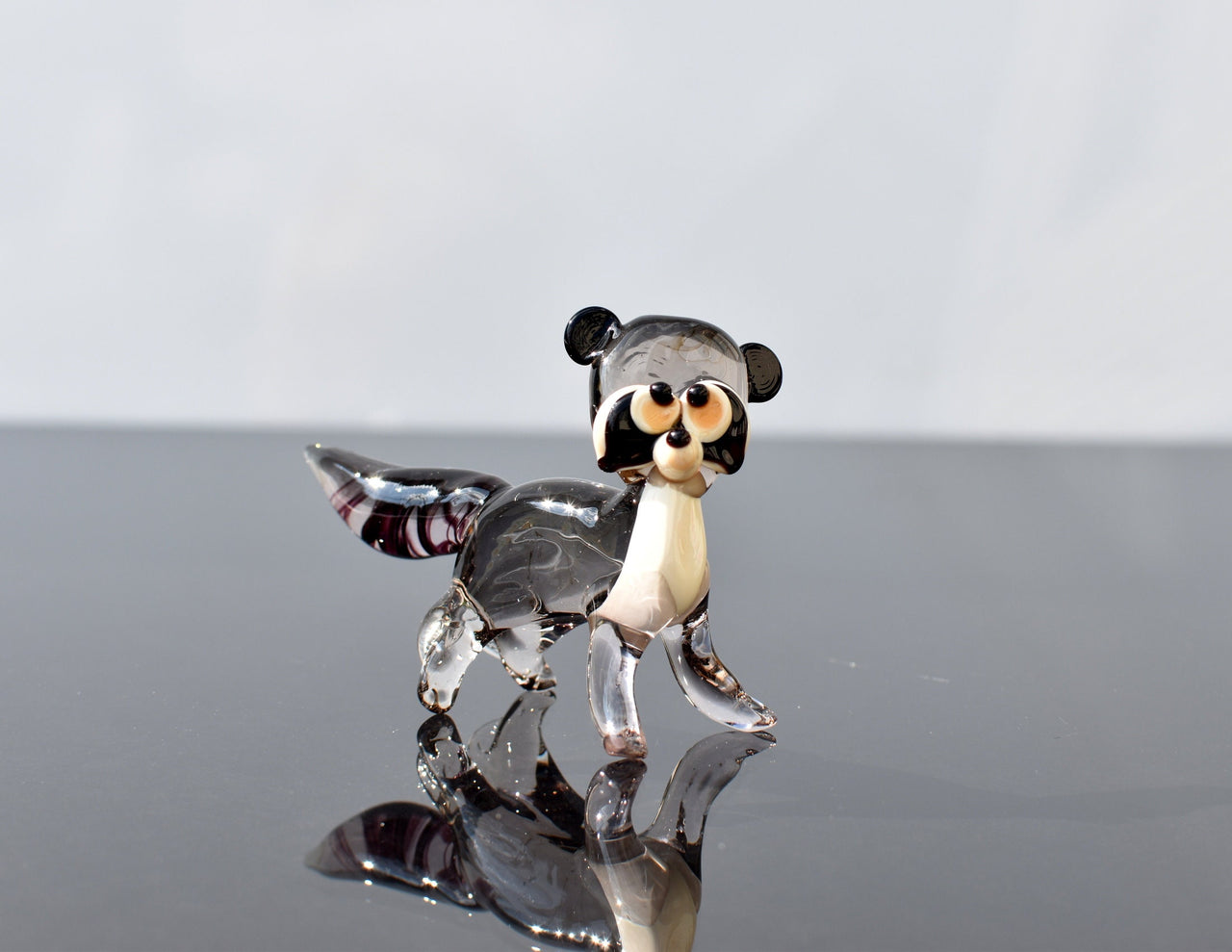 Handmade Glass Raccoon Figurine: Whimsical Animal Sculpture