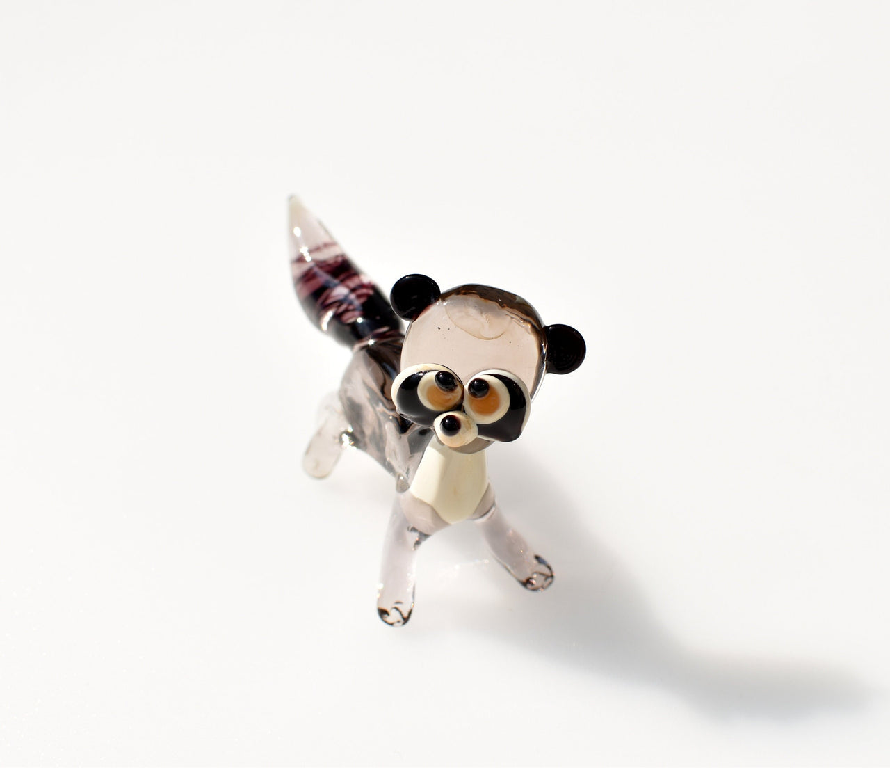 Handmade Glass Raccoon Figurine: Whimsical Animal Sculpture