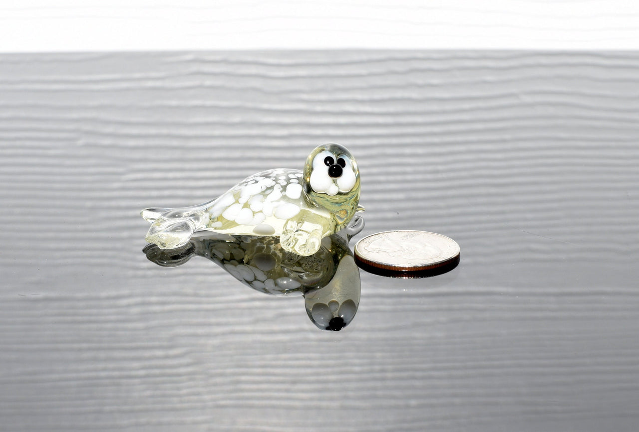 Handmade Glass Baby Seal Figurine: Lemonade Color, Whimsical Sculpture