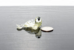 Handmade Glass Baby Seal Figurine: Lemonade Color, Whimsical Sculpture