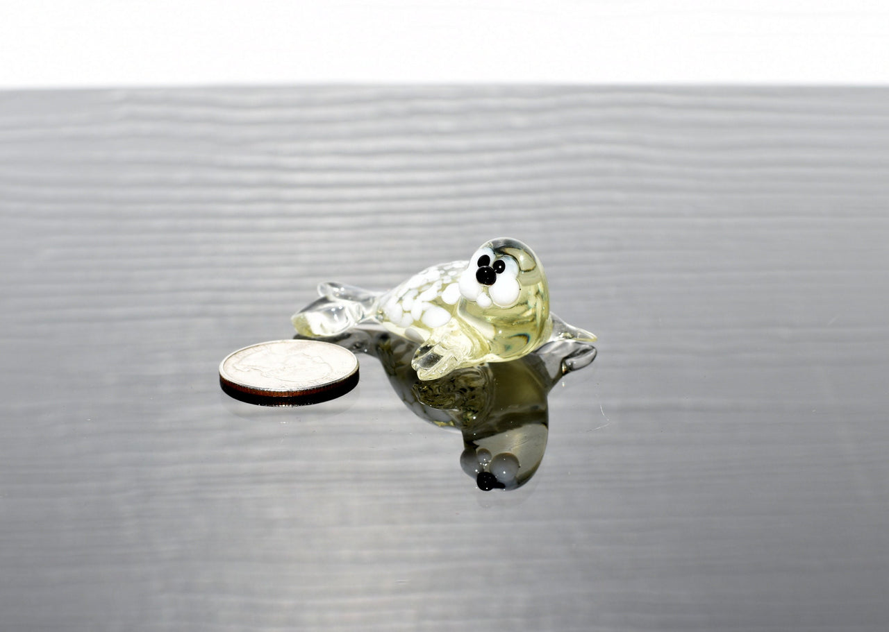Handmade Glass Baby Seal Figurine: Lemonade Color, Whimsical Sculpture