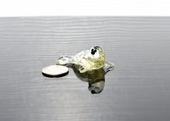 Handmade Glass Baby Seal Figurine: Lemonade Color, Whimsical Sculpture