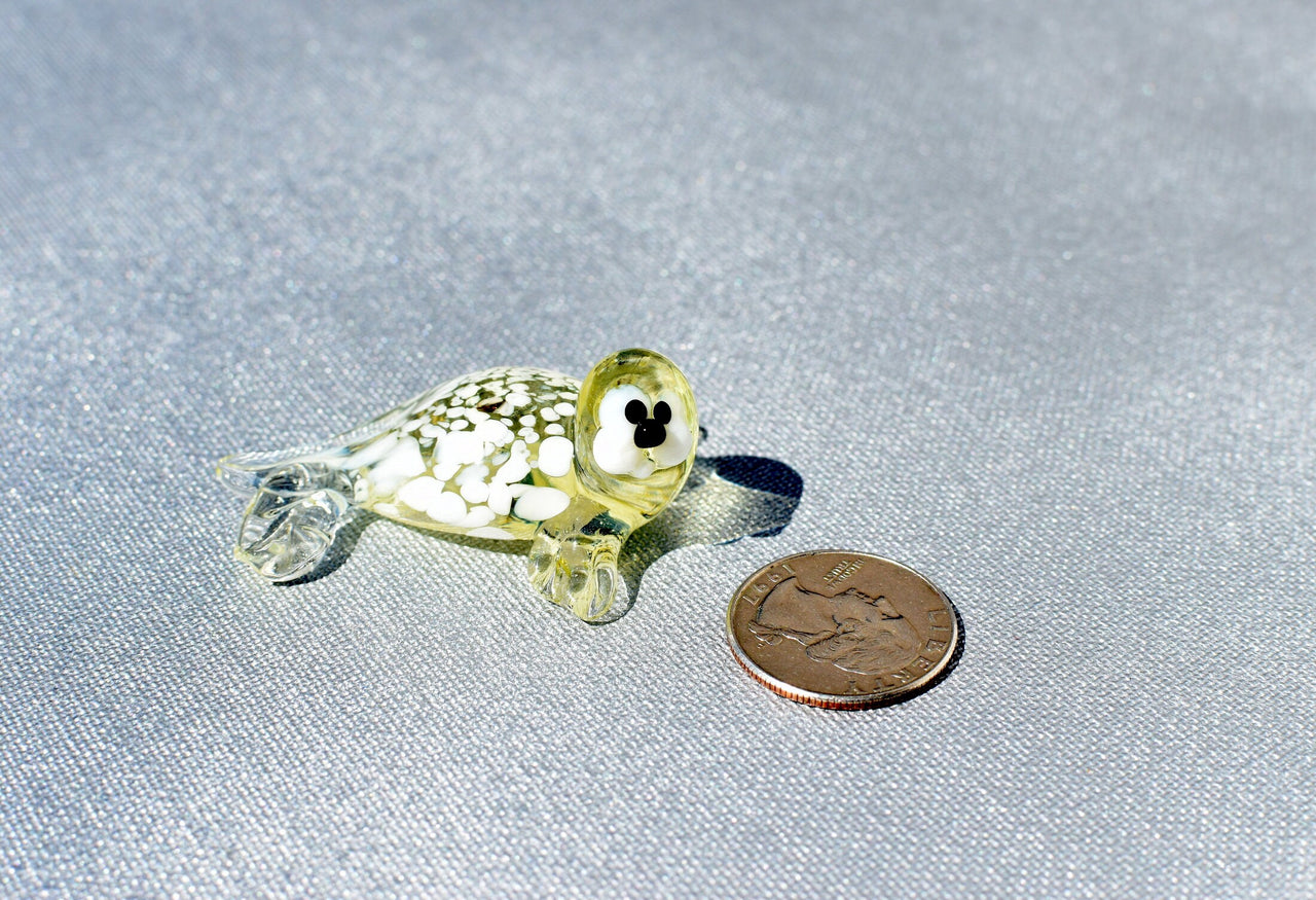 Handmade Glass Baby Seal Figurine: Lemonade Color, Whimsical Sculpture