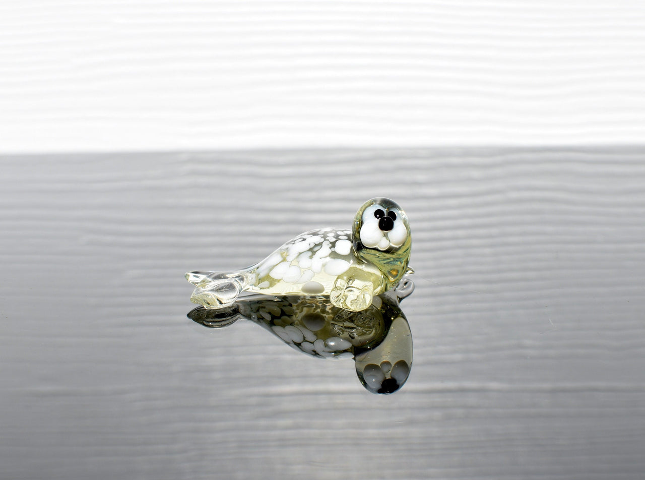 Handmade Glass Baby Seal Figurine: Lemonade Color, Whimsical Sculpture
