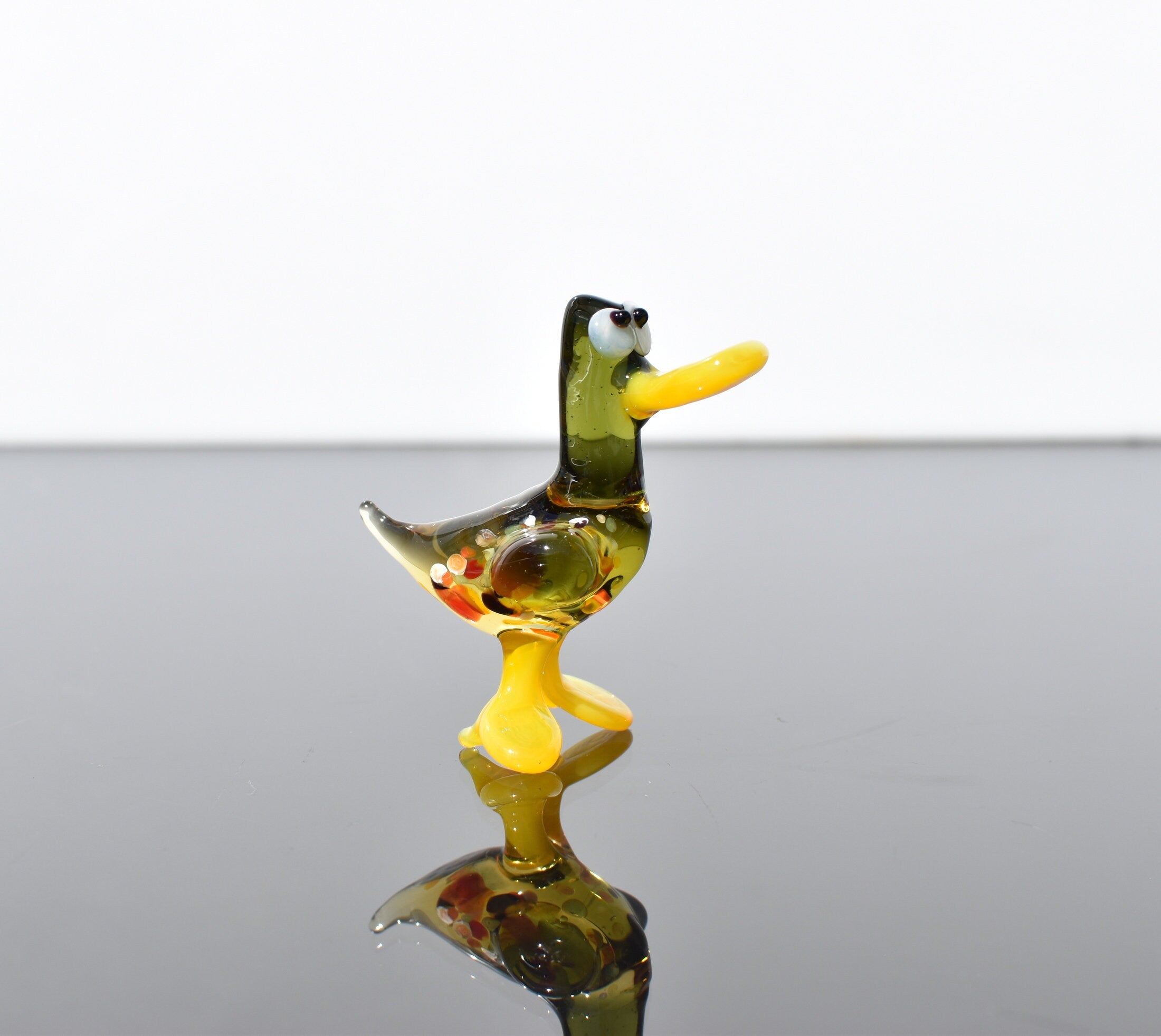 Cute Glass  Duck. Whimsical figurine with a lot of character and personality. Excellent addition to your glass menagerie collection.