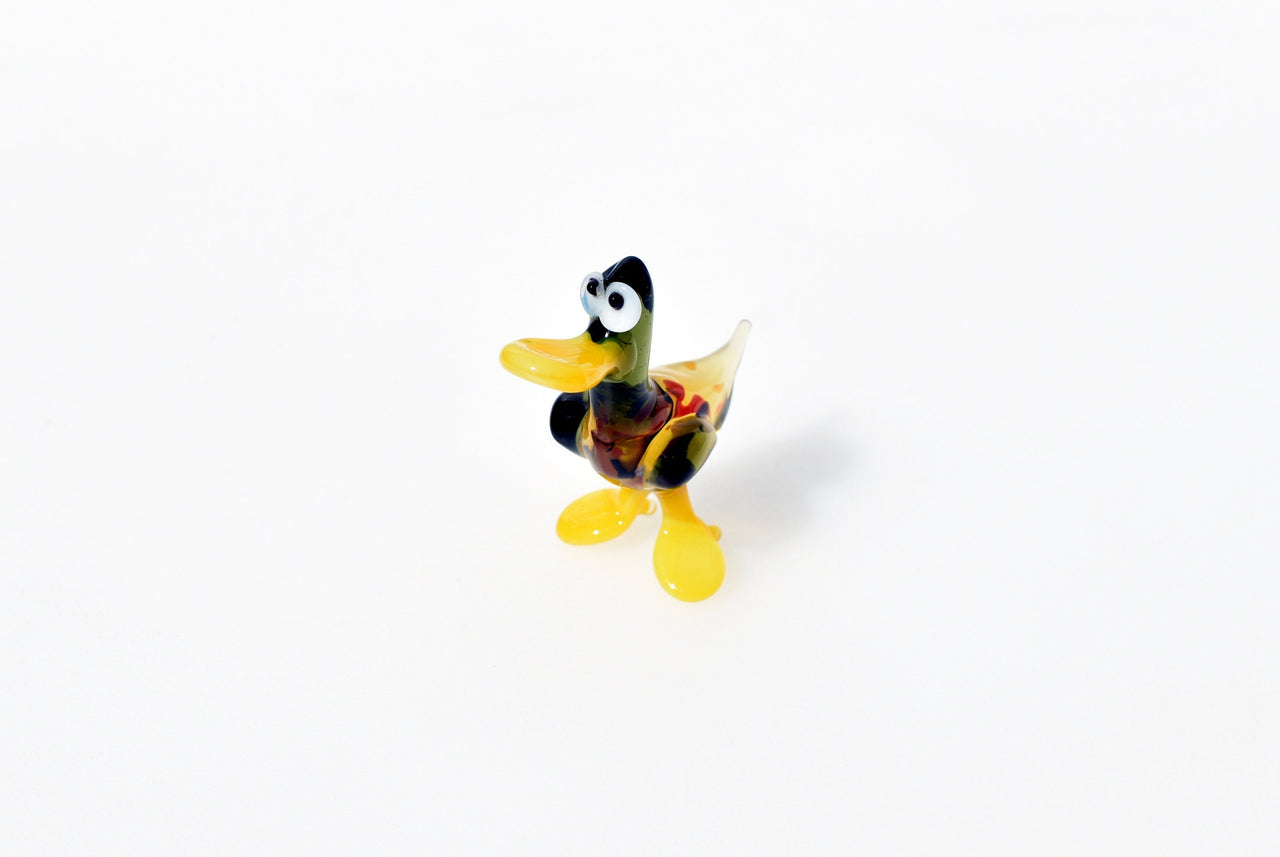 Cute Glass  Duck. Whimsical figurine with a lot of character and personality. Excellent addition to your glass menagerie collection.