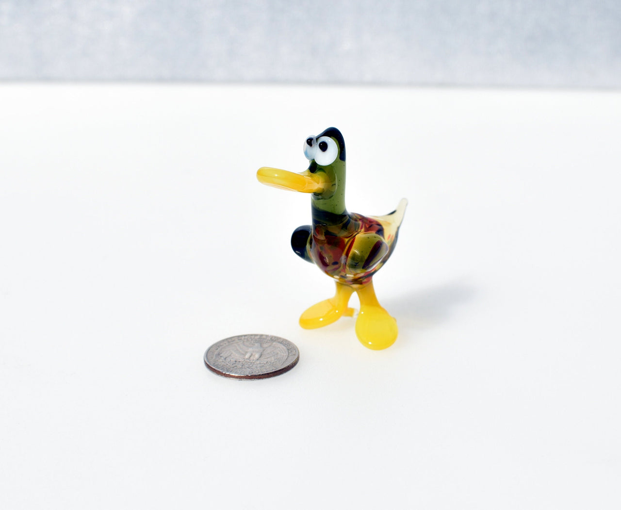 Cute Glass  Duck. Whimsical figurine with a lot of character and personality. Excellent addition to your glass menagerie collection.