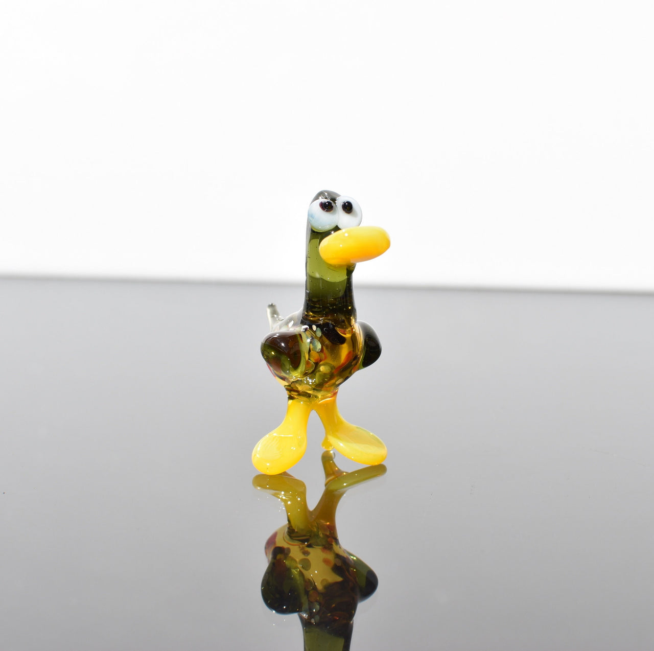 Cute Glass  Duck. Whimsical figurine with a lot of character and personality. Excellent addition to your glass menagerie collection.