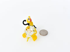 Cute yellowish-clear Glass Turtle with ambarella . Whimsical figurine with character and personality. Excellent addition to your collection.
