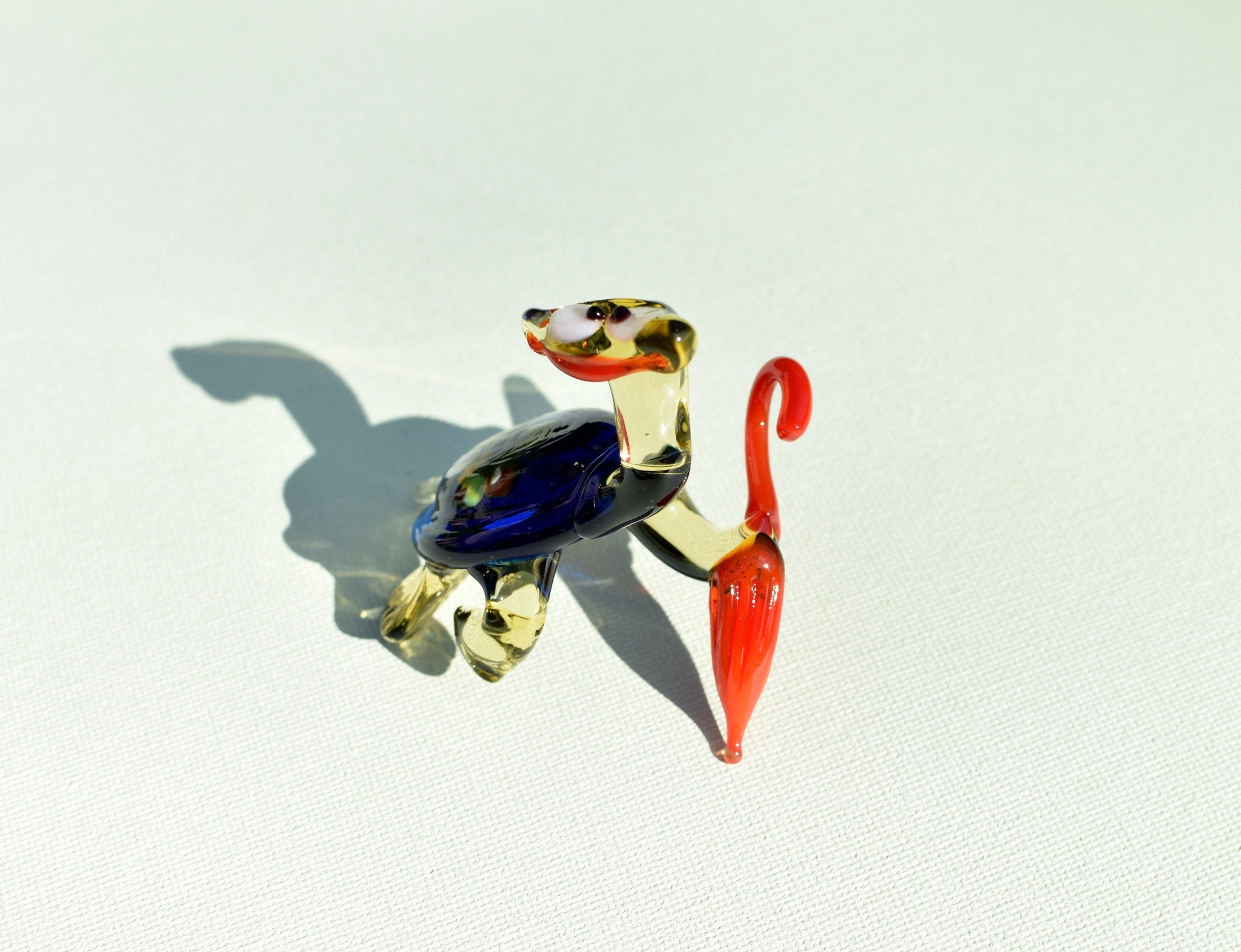 Cute blue-red Glass Turtle with ambarella . Whimsical figurine with character and personality. Excellent addition to your collection.