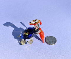 Cute blue-red Glass Turtle with ambarella . Whimsical figurine with character and personality. Excellent addition to your collection.