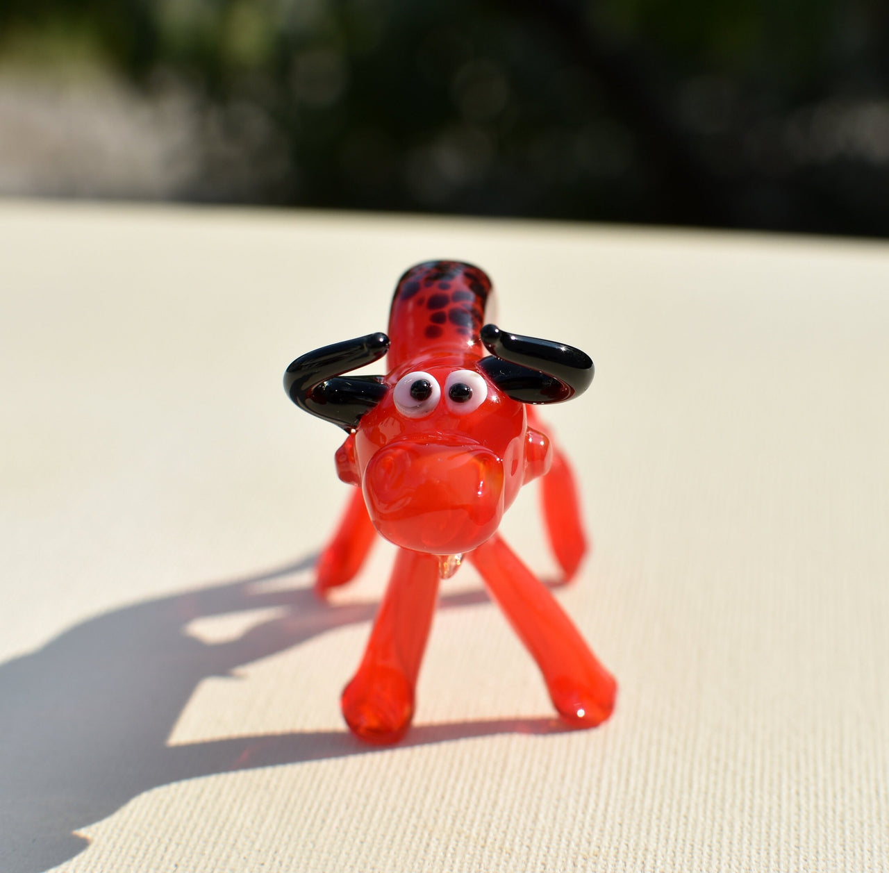 Handmade Red Glass Bull Figurine: Whimsical Flamework Animal