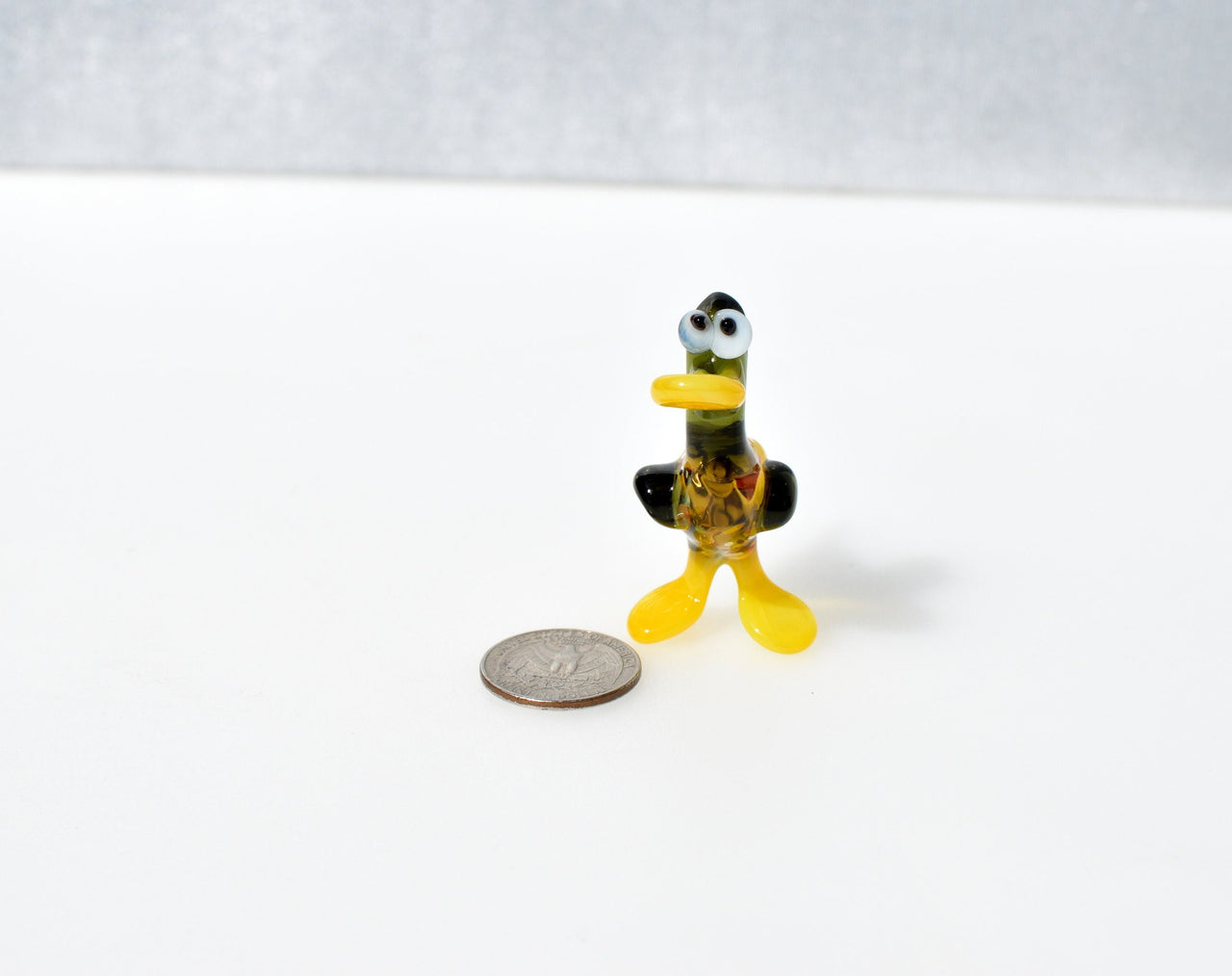 Cute Glass  Duck. Whimsical figurine with a lot of character and personality. Excellent addition to your glass menagerie collection.
