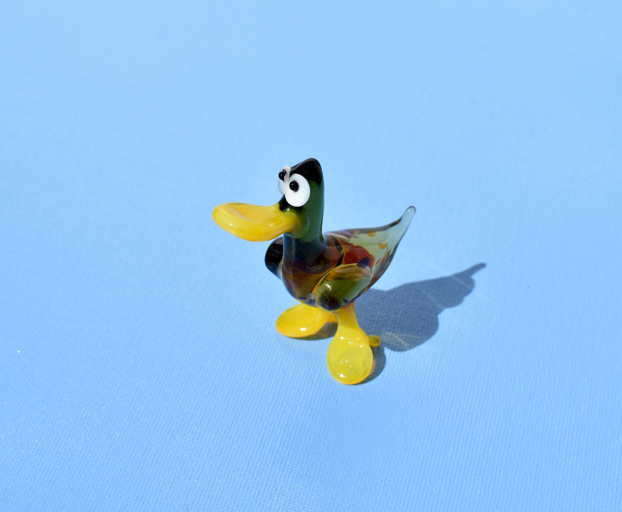 Cute Glass  Duck. Whimsical figurine with a lot of character and personality. Excellent addition to your glass menagerie collection.