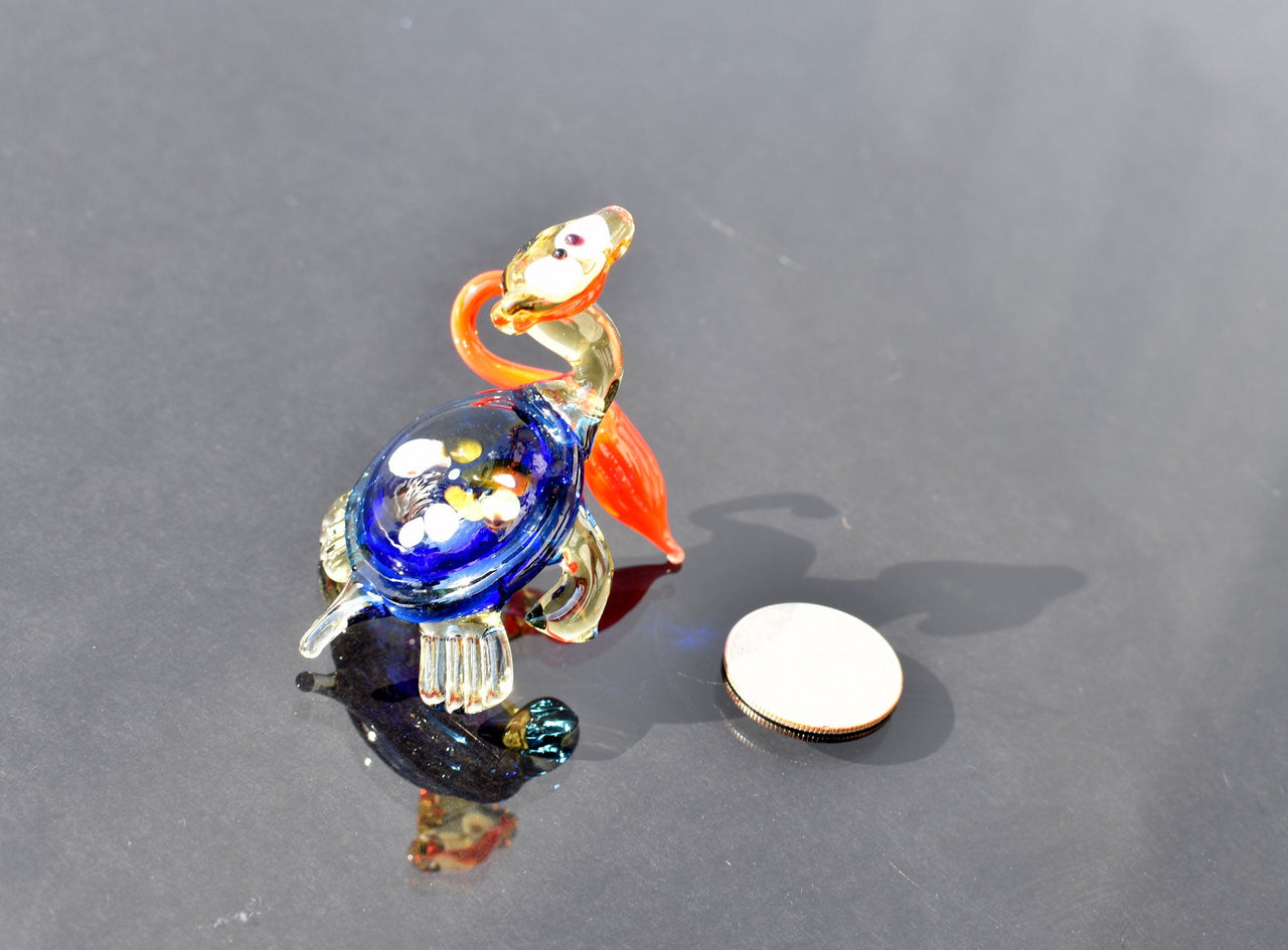Cute blue-red Glass Turtle with ambarella . Whimsical figurine with character and personality. Excellent addition to your collection.