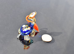 Cute blue-red Glass Turtle with ambarella . Whimsical figurine with character and personality. Excellent addition to your collection.