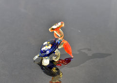 Cute blue-red Glass Turtle with ambarella . Whimsical figurine with character and personality. Excellent addition to your collection.