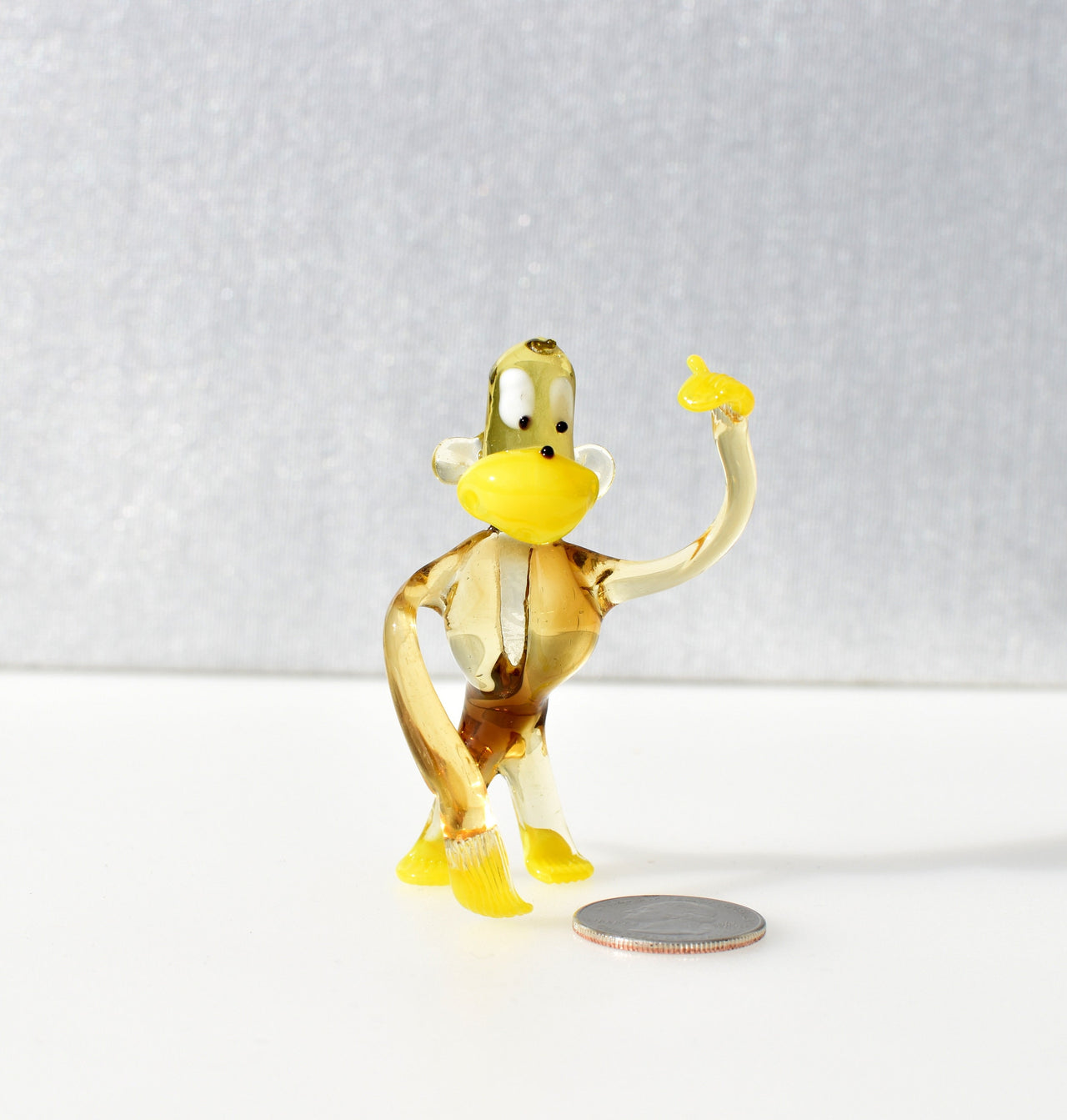 Handmade Transparent Glass Monkey Figurine: Whimsical Art Glass Sculpture