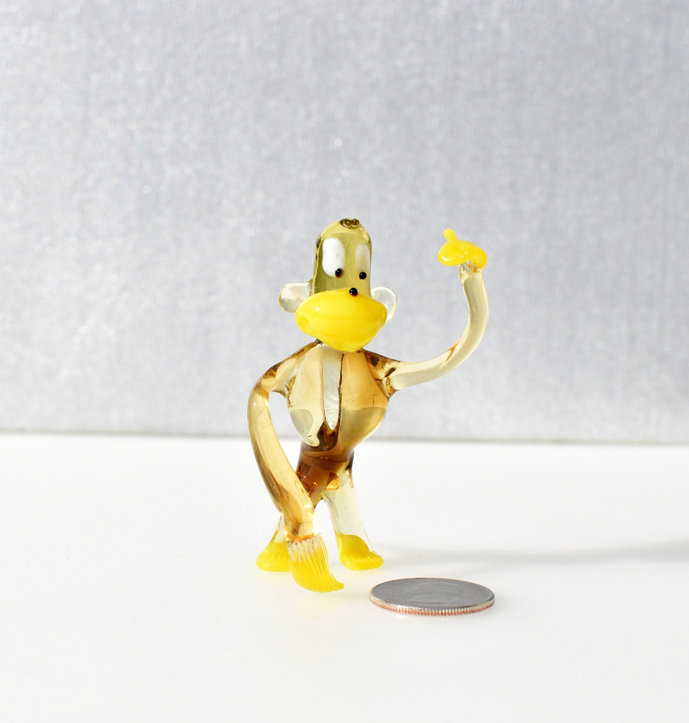 Handmade Transparent Glass Monkey Figurine: Whimsical Art Glass Sculpture