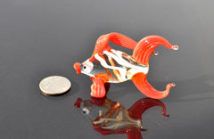 Cute Glass red-clear colorful goldfish. Detailed figurine with a lot of character and personality.  Excellent addition to your collection.