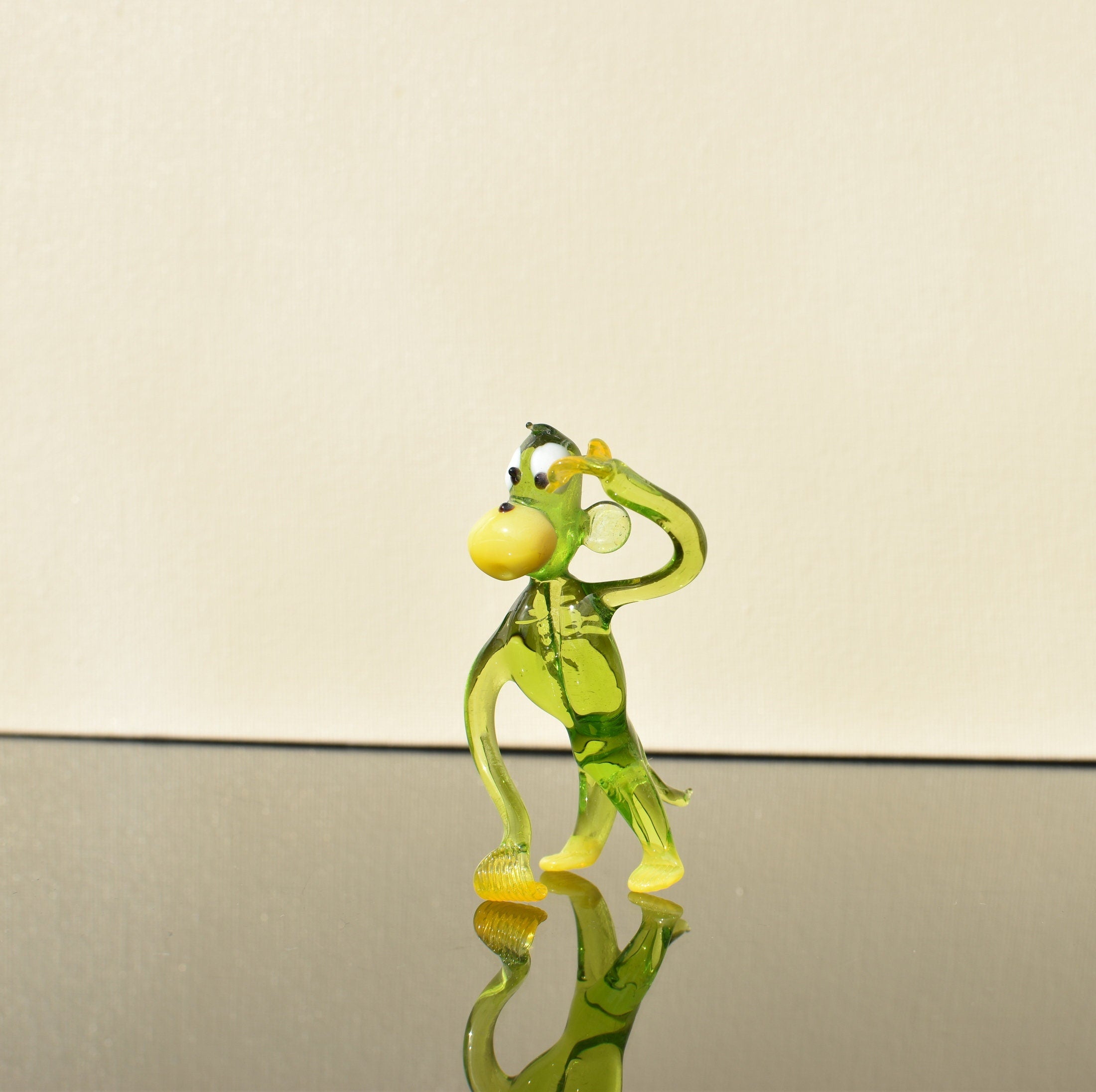 Handmade Glass Monkey Figurine: Whimsical Green Sculpture
