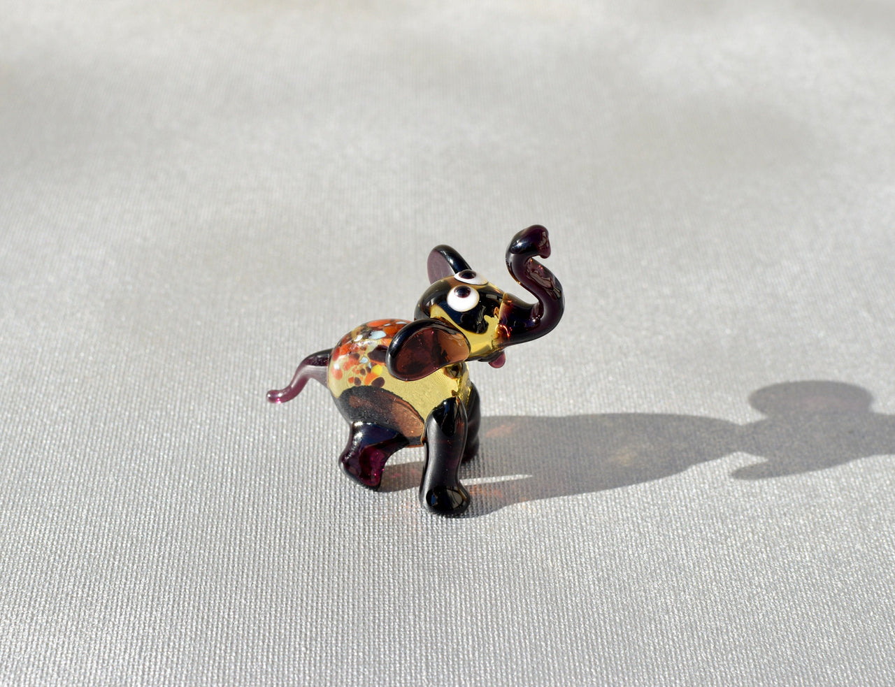 Handmade Purple Glass Elephant Figurine: Whimsical Art Glass Sculpture