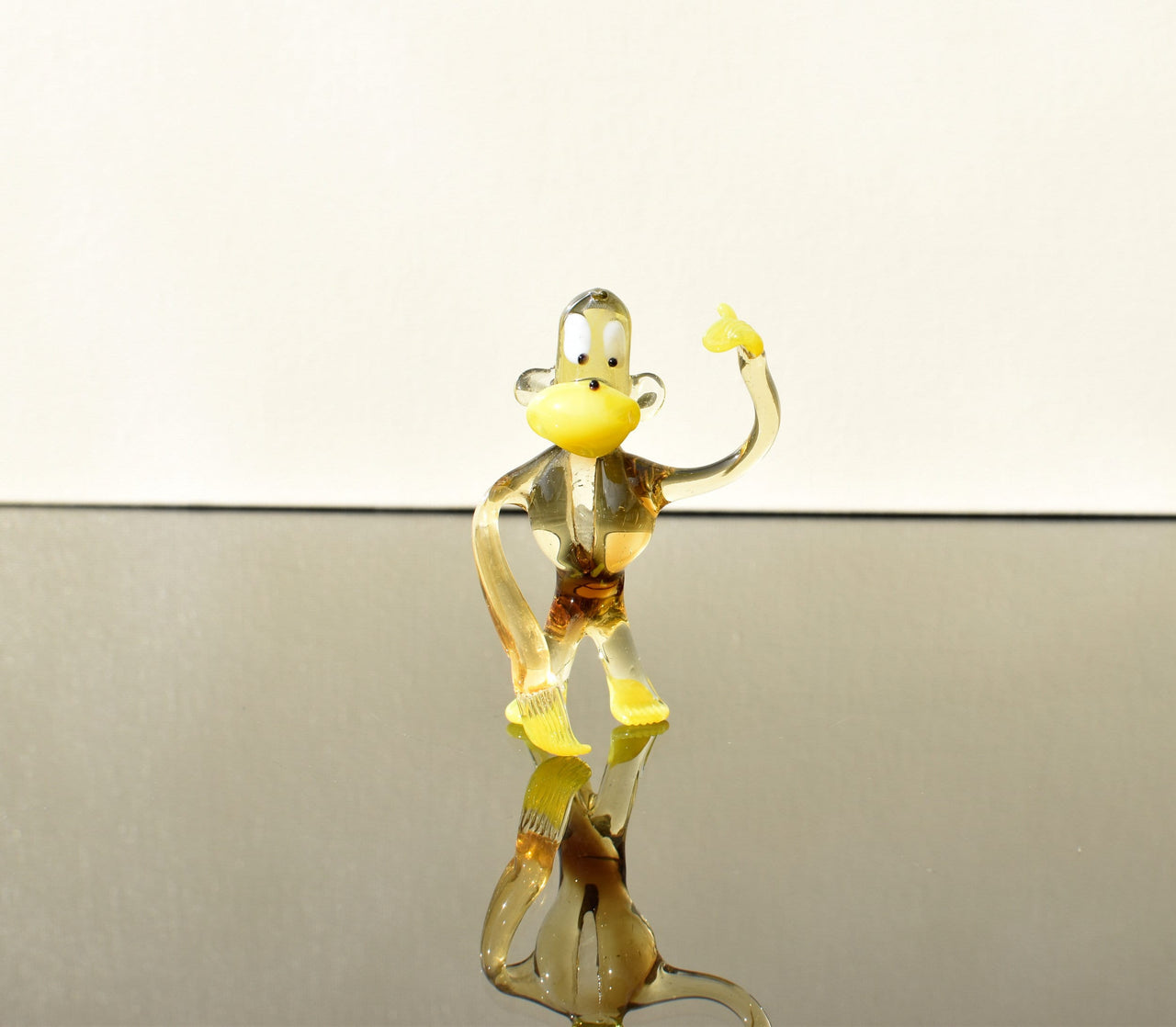 Handmade Transparent Glass Monkey Figurine: Whimsical Art Glass Sculpture