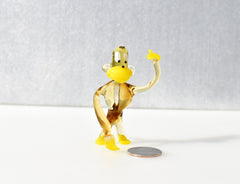 Handmade Transparent Glass Monkey Figurine: Whimsical Art Glass Sculpture
