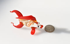 Cute Glass red-clear colorful goldfish. Detailed figurine with a lot of character and personality.  Excellent addition to your collection.
