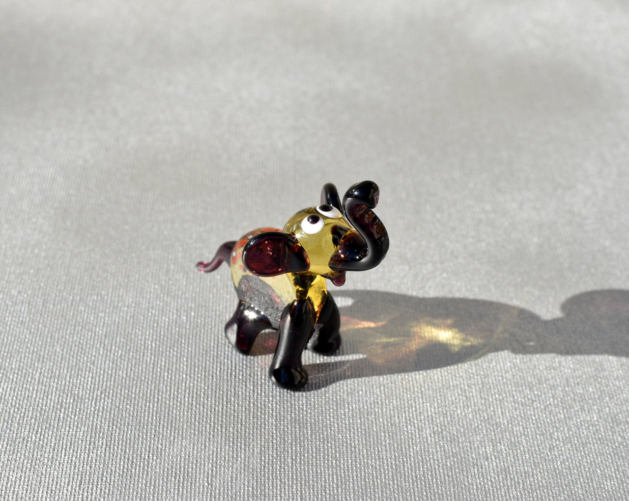 Handmade Purple Glass Elephant Figurine: Whimsical Art Glass Sculpture