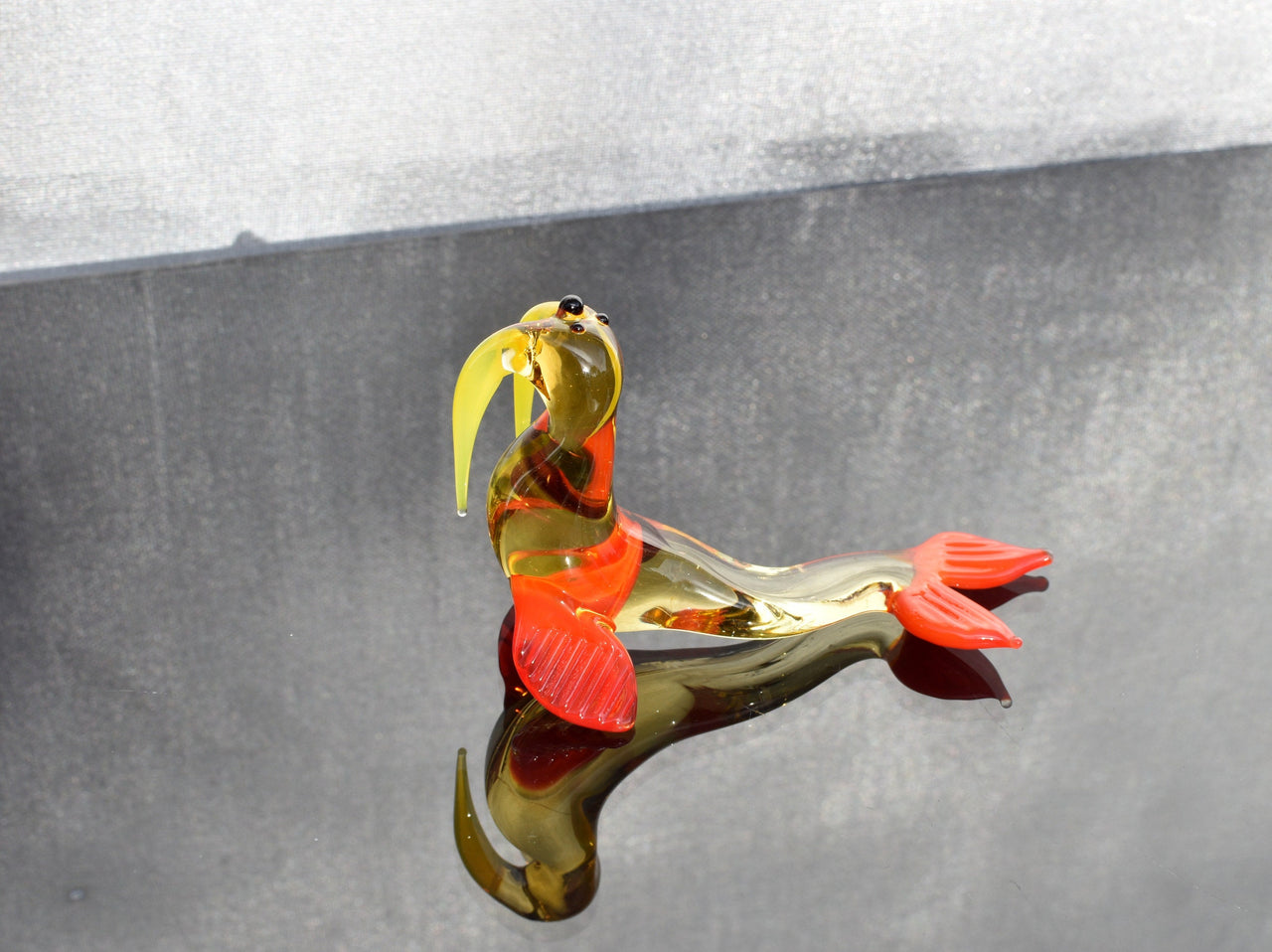 Cute transparent Glass Walrus. Whimsical figurine with a lot of character and personality. Excellent addition to your collection.