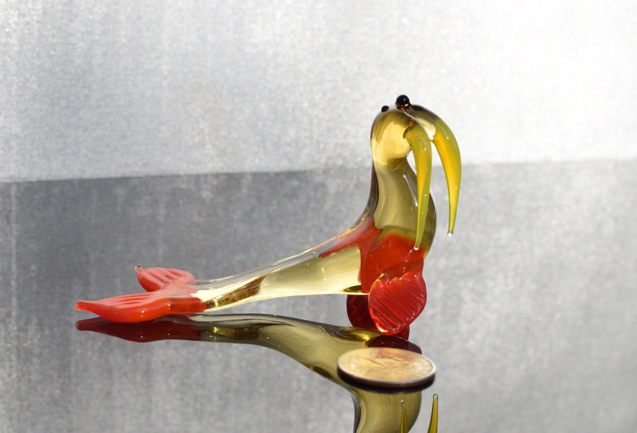 Cute transparent Glass Walrus. Whimsical figurine with a lot of character and personality. Excellent addition to your collection.