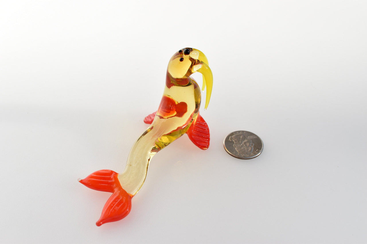 Cute transparent Glass Walrus. Whimsical figurine with a lot of character and personality. Excellent addition to your collection.