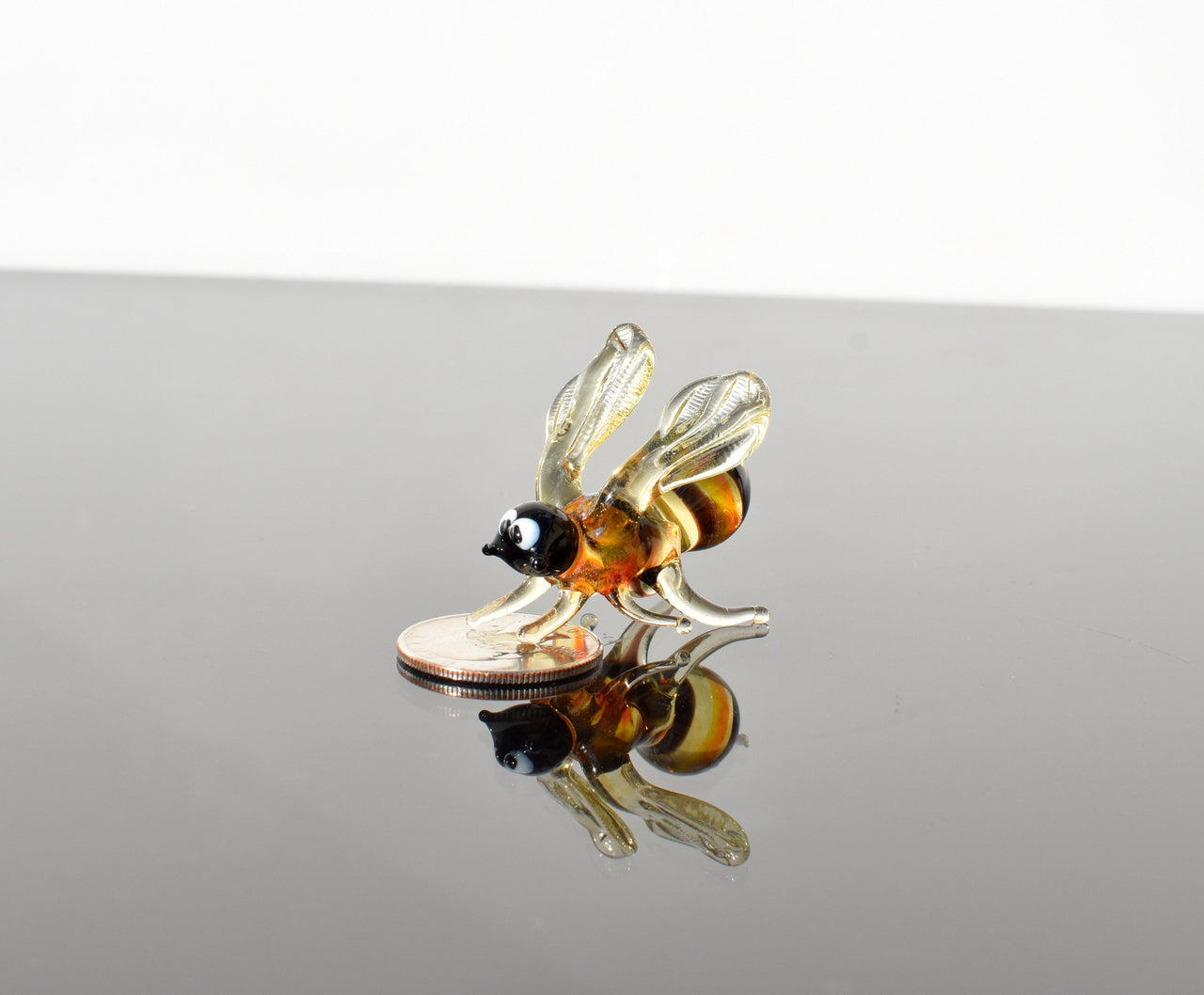 Cute Glass Bee. Whimsical figurine with a lot of character and personality. Excellent addition to your glass menagerie collection.