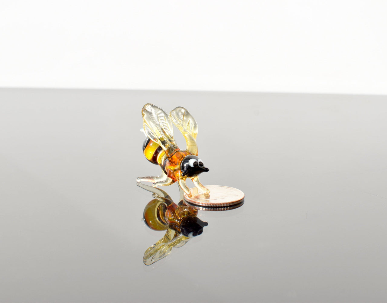 Cute Glass Bee. Whimsical figurine with a lot of character and personality. Excellent addition to your glass menagerie collection.