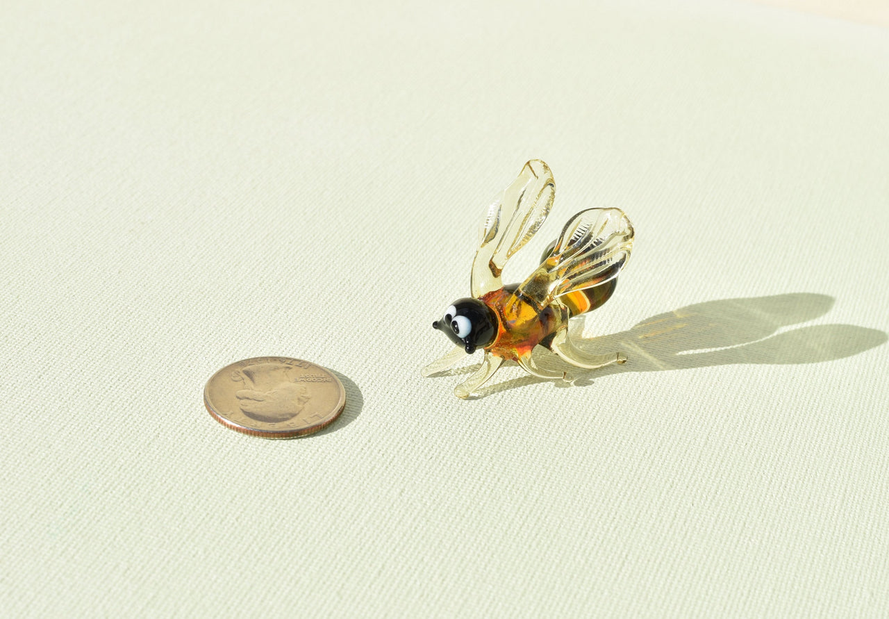 Cute Glass Bee. Whimsical figurine with a lot of character and personality. Excellent addition to your glass menagerie collection.