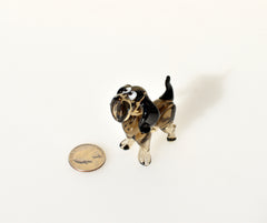 Cute  glass dog. Whimsical figurine; lot of character and personality. Excellent addition to your glass collection, unique gift.