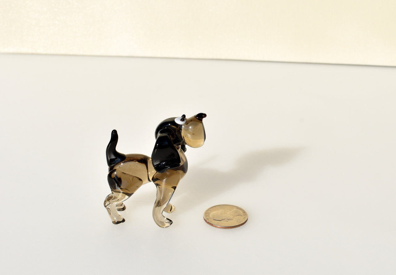Cute  glass dog. Whimsical figurine; lot of character and personality. Excellent addition to your glass collection, unique gift.