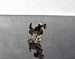 Cute  glass dog. Whimsical figurine; lot of character and personality. Excellent addition to your glass collection, unique gift.