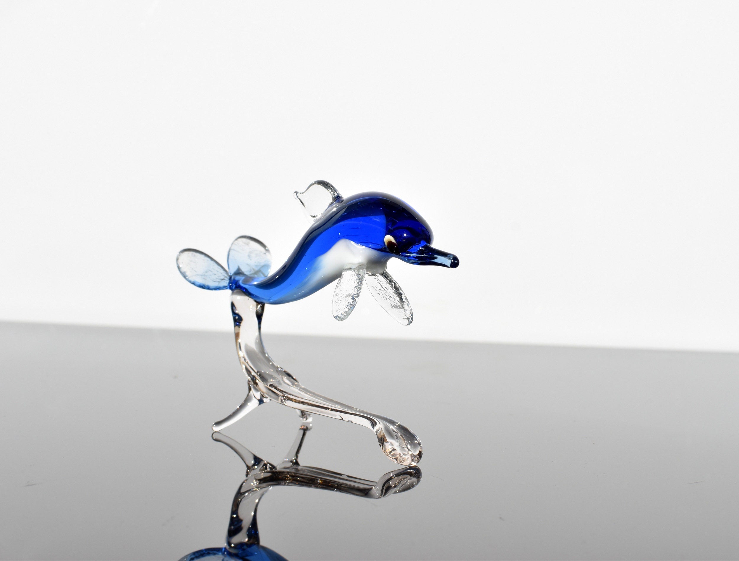 Blue Glass Dolphin Figurine: Hand-Blown Whimsical Sculpture
