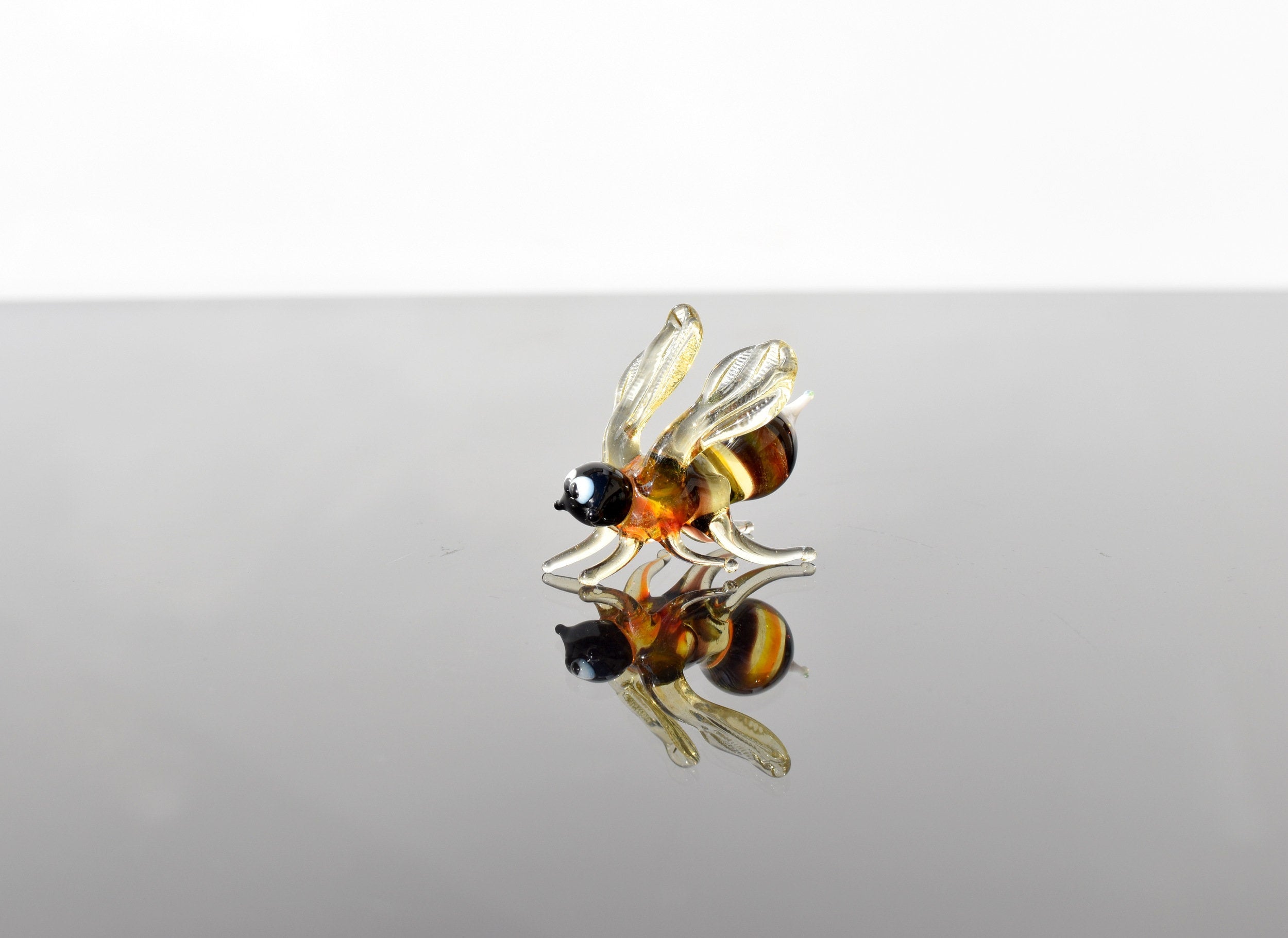 Cute Glass Bee. Whimsical figurine with a lot of character and personality. Excellent addition to your glass menagerie collection.