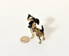 Cute  glass dog. Whimsical figurine; lot of character and personality. Excellent addition to your glass collection, unique gift.