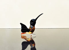 Beautiful colored Glass clear black hummingbird. Detailed figurine with character and personality.  Excellent addition to your collection.
