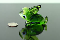 Cute  Green Glass Bunny. Detailed figurine with a lot of personality. Excellent addition to your glass menagerie collection.