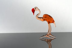 Rosy transparent Glass Flamingo. Detailed figurine with a lot of personality.  Excellent addition to your glass animals collection.